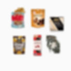 Christmas gift box with chocolate, chocolate drizzled dried oranges, peppermint caramel popcorn, crackers and brie cheese.