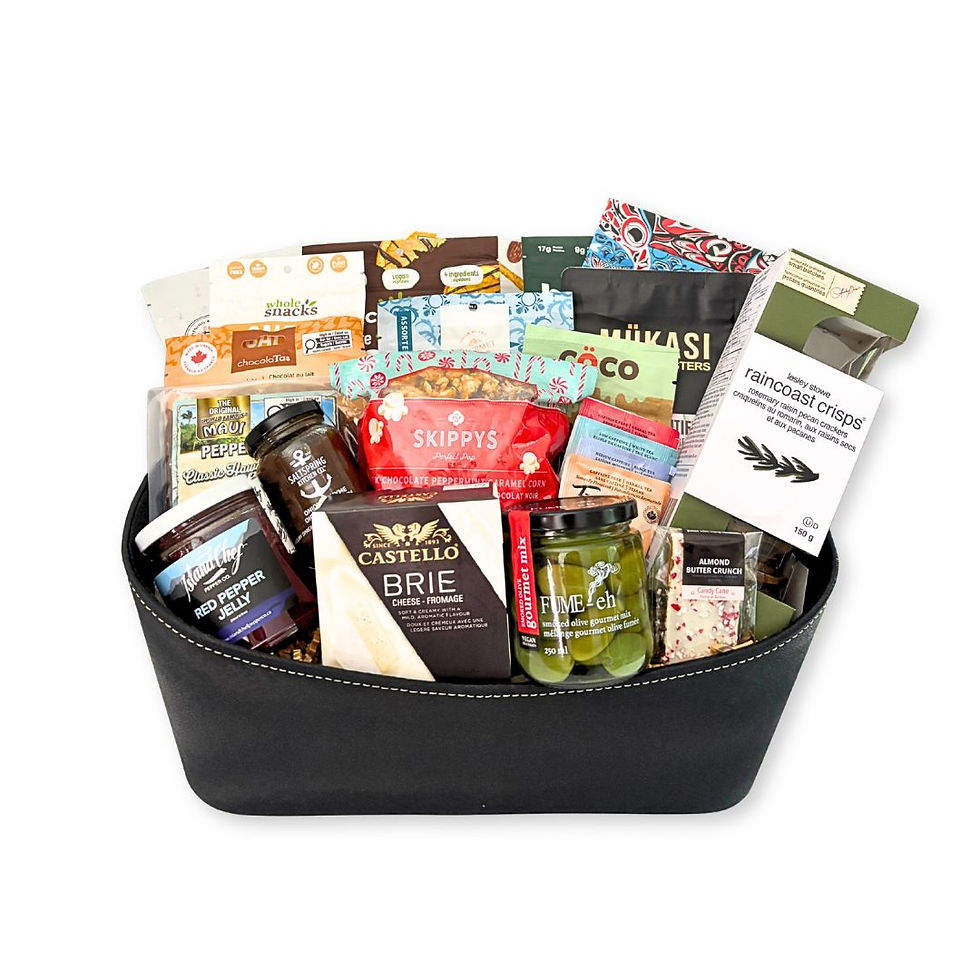 The Christmas Spread Gift Basket with gourmet snacks, Brie, chocolates, coffee and tea.