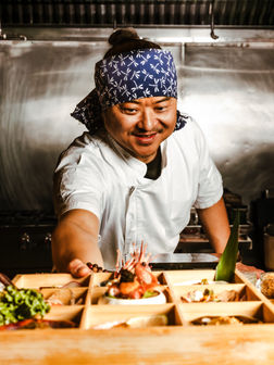 Yoichi Chef serving an omakase box