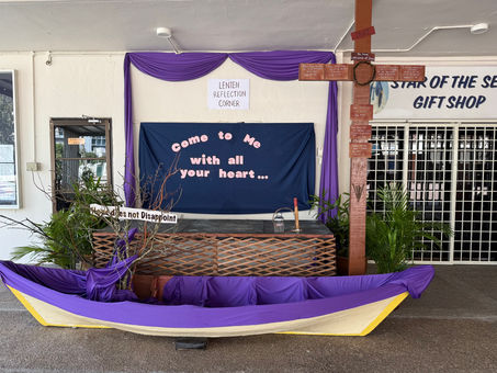 AT THE FOOT OF THE CROSS