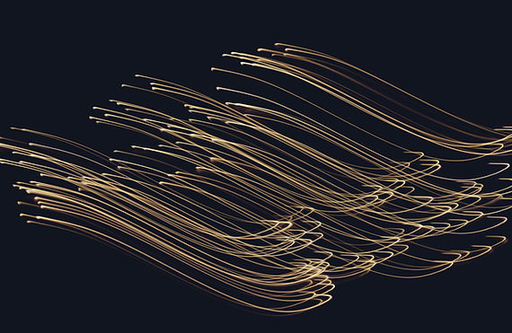 Abstract golden light streaks against a dark background, dynamic wave patterns.