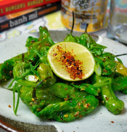Fresh green vegetable side dish with citrus and seasoning.