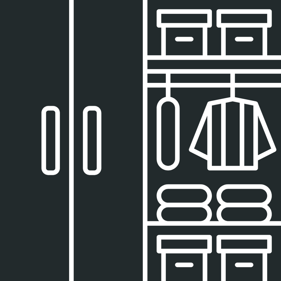 Icono de armario organizado con ropa y cajas