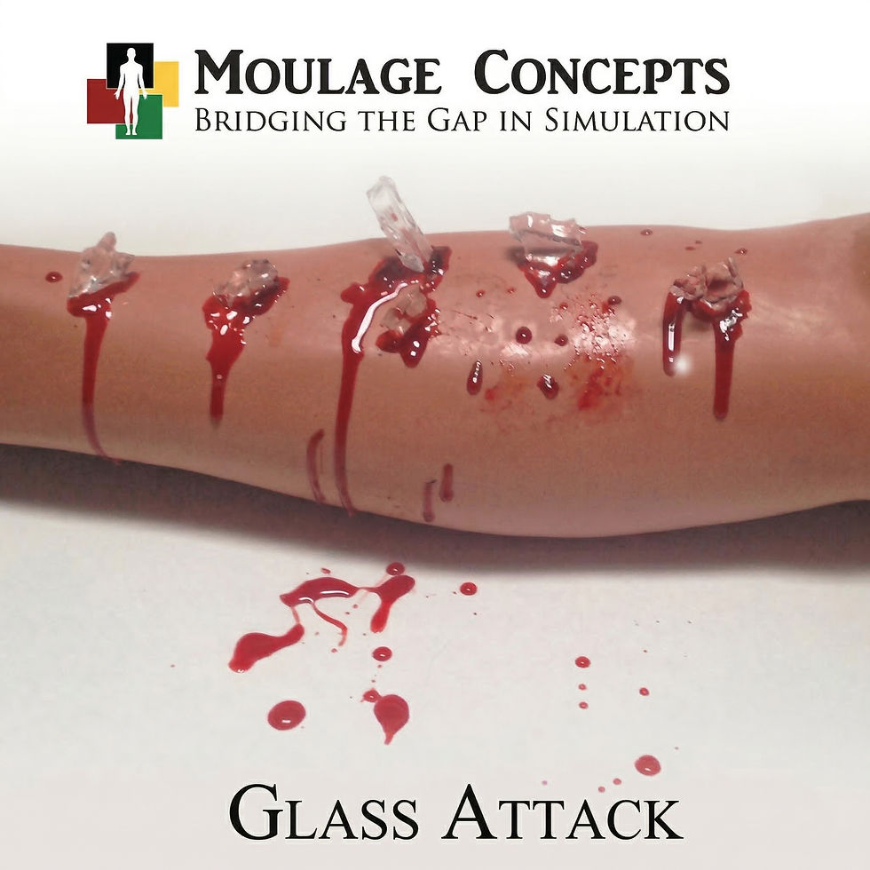 Simulated arm with glass shards and blood, 'GLASS ATTACK' scenario for EMS training.