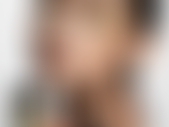 Close-up of a woman's face with gold glitter makeup. Yeshua Skin Cosmetics products are displayed. Elegant, shimmering aesthetic.