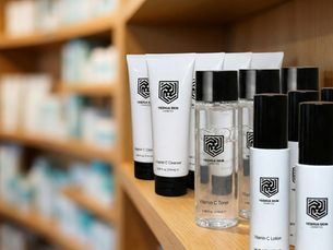 Eye-level view of skincare products neatly arranged on store shelves