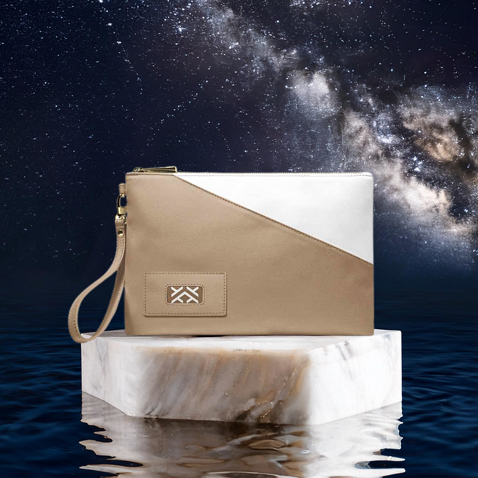 Beige and white clutch on marble pedestal, reflecting on water. Starry night sky background. Elegant and serene mood.
