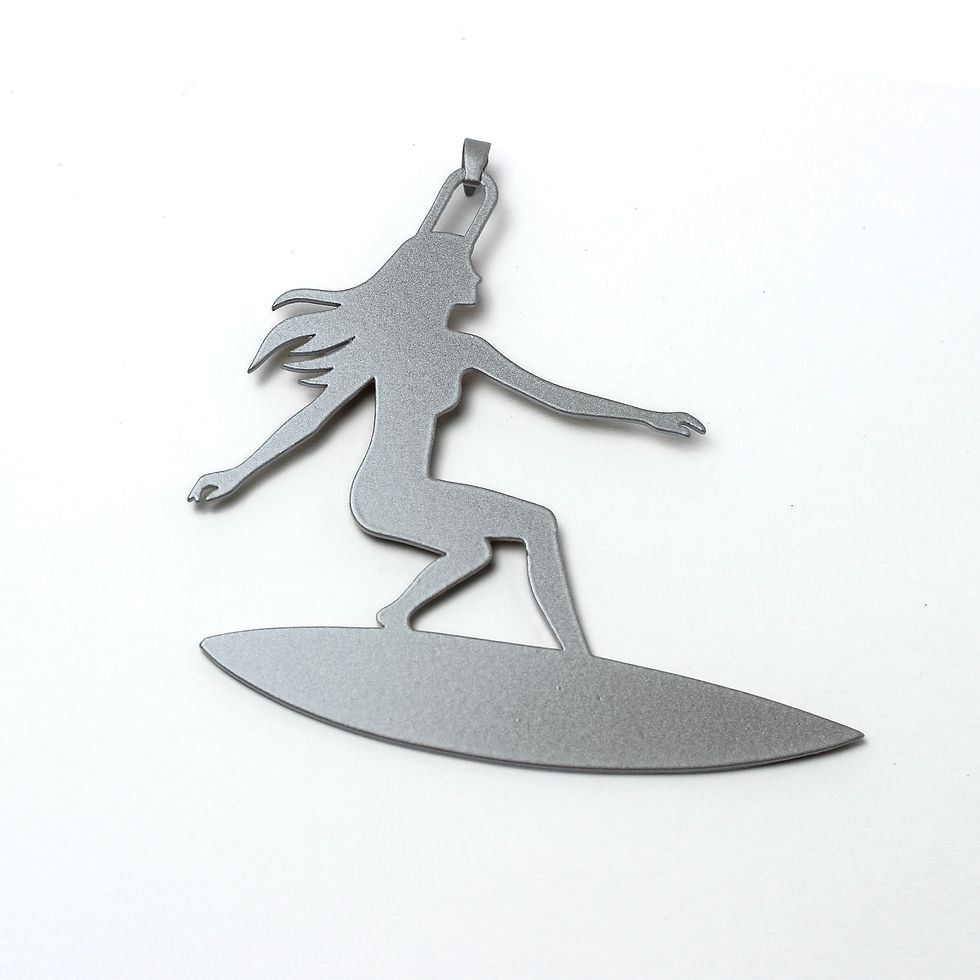 Silver female surfer charm pendant on white background