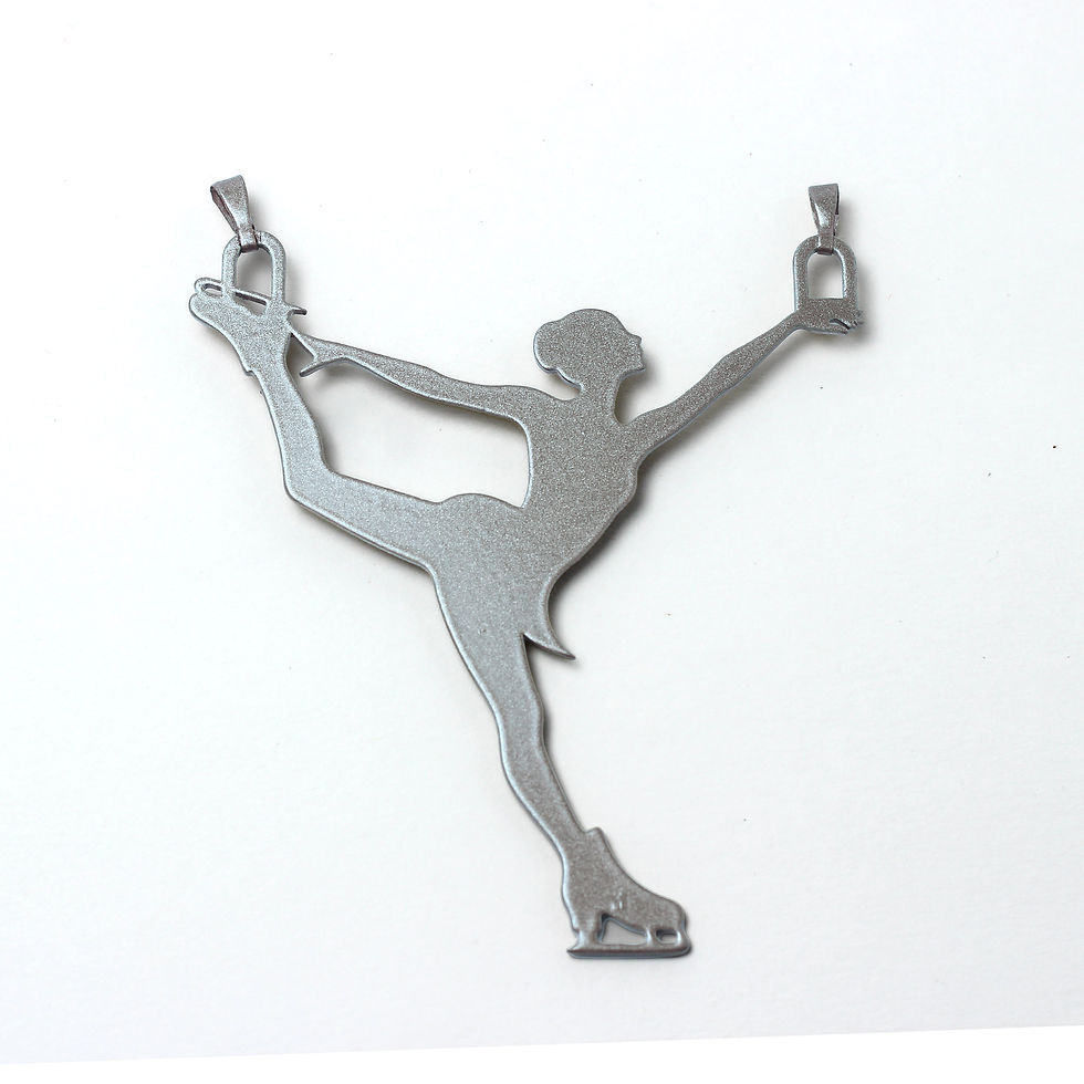 Silver figure skater charm in a catch-foot spiral pose.
