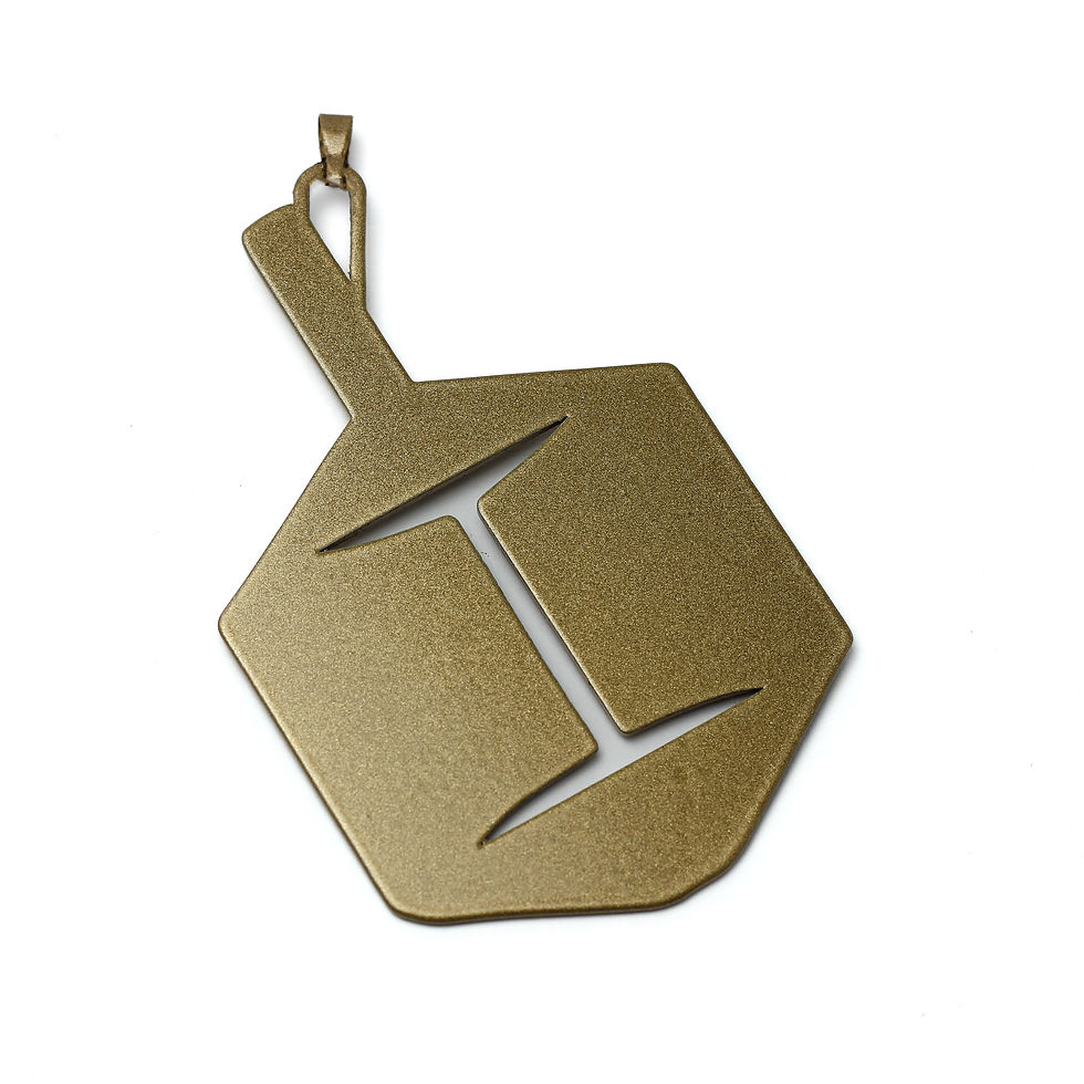 Gold dreidel charm with cut-out Hebrew letter Gimel