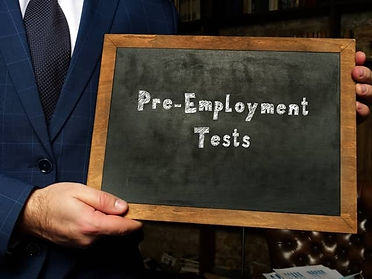 person holding pre employment test board in Detroit