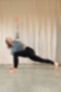 Group Yoga, Pilates and Barre class in a bright, clean studio, participants practicing various poses. Varierty of Yoga, Pilates and Barre classes available for all-levels of fitness and experience.