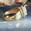 Thumbnail: Vintage 14K Gold Opal and Diamond Marquise Halo Ring