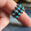 Thumbnail: Vintage Zuni Turquoise Silver Double Row Snake Eyes Petit Point Ring
