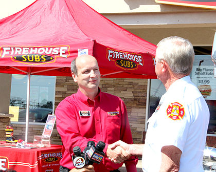wChief,ChrisH shake hands