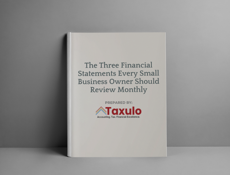 Business owners reviewing profit and loss, balance sheet, and cash flow reports
