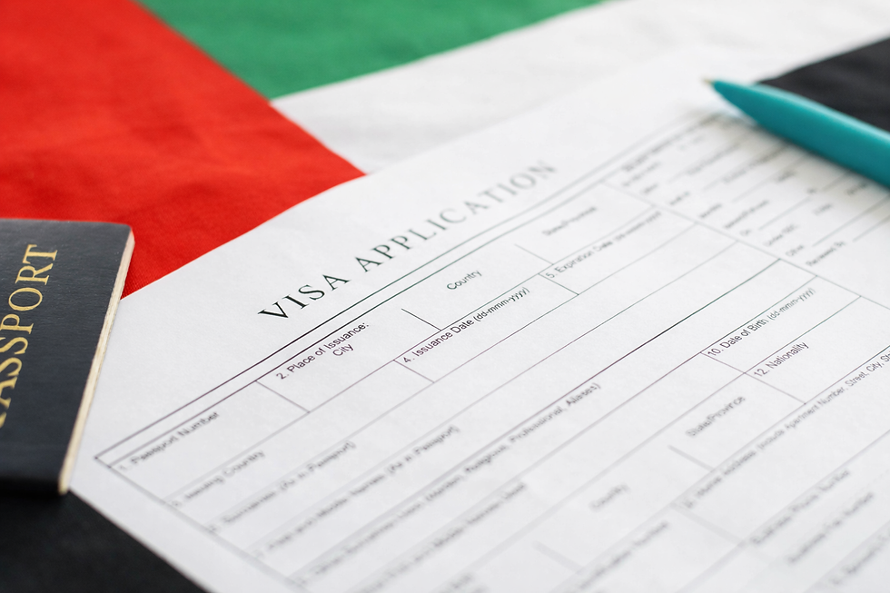 Visa application form and passport on UAE flag representing visa applications and travel planning from the UAE
