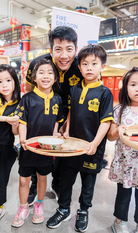 Mike Tan with kids
