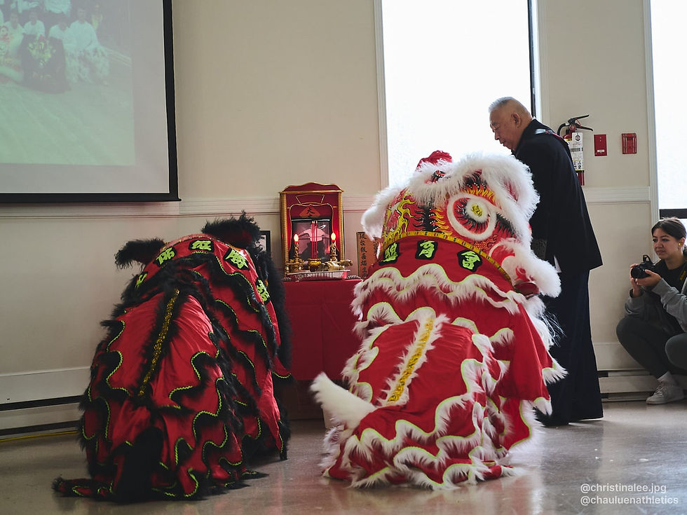 Sigung Peter Wong and lion dancers at Wong Sheung's altar in Victoria, BC