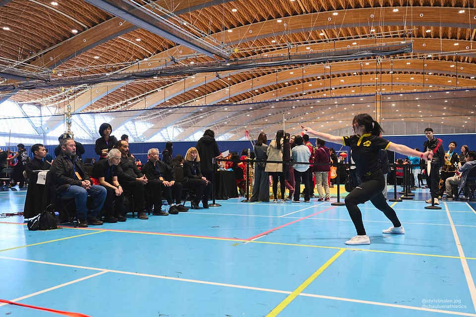 Leanne bows to the judges during kung fu dagger form