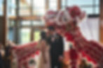 Lion dance wedding kiss pose