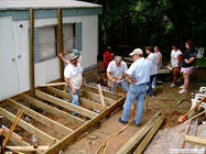 Volunteers building a deck
