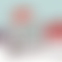 Phone with Santa hat and "Out of Office" note on desk, next to red gift boxes. Starry light blue background, festive holiday mood.