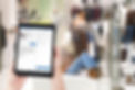 Envimo showing on tablet in front of shop window
