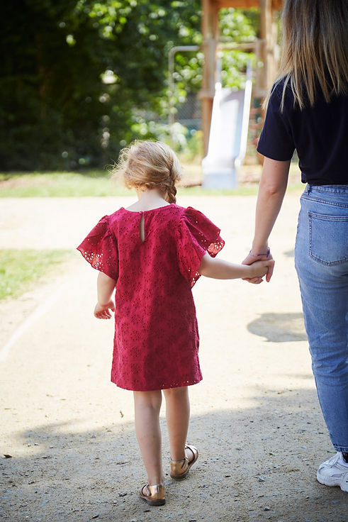 nanny with kid on a park