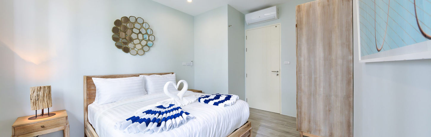 Samui-Bayside-Luxury-Villas-13B-Bed-scaled.jpg