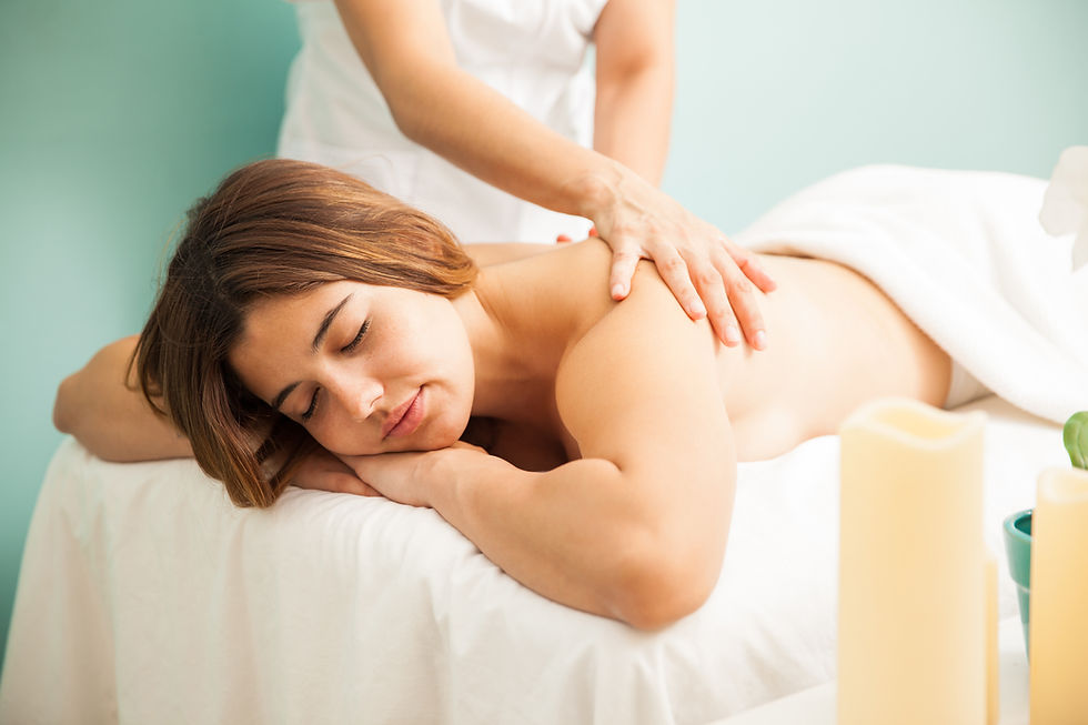 beautiful-young-hispanic-woman-falling-asleep-as-masseuse-gives-her-very-relaxing-massage-
