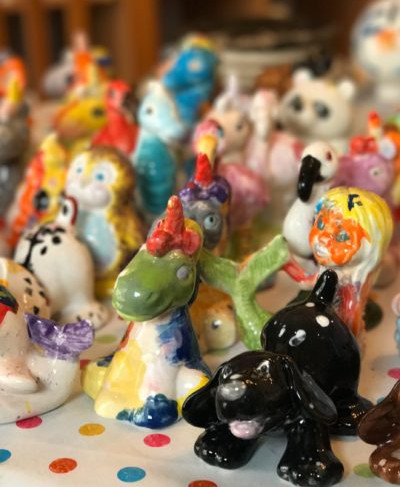 Collection of colorful handmade animal figurines, perfect for children