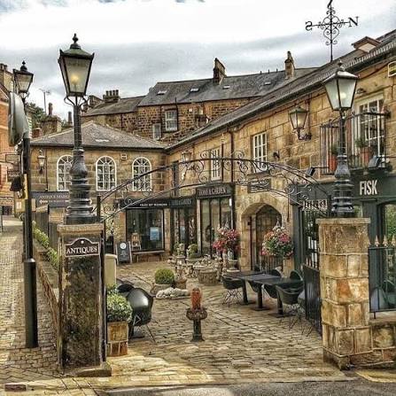 Stone building with street lamps and FISK sign; best spas in Harrogate.