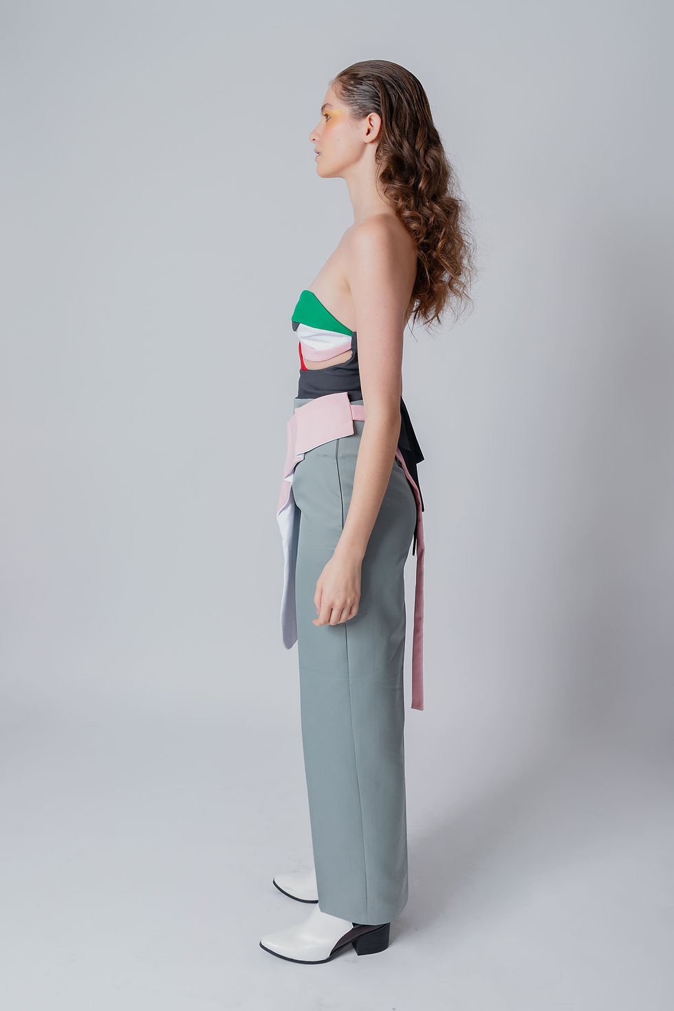 Thumbnail: Straight Leg Gray Pants with hidden pockets on the sides and belt with pink pouch.