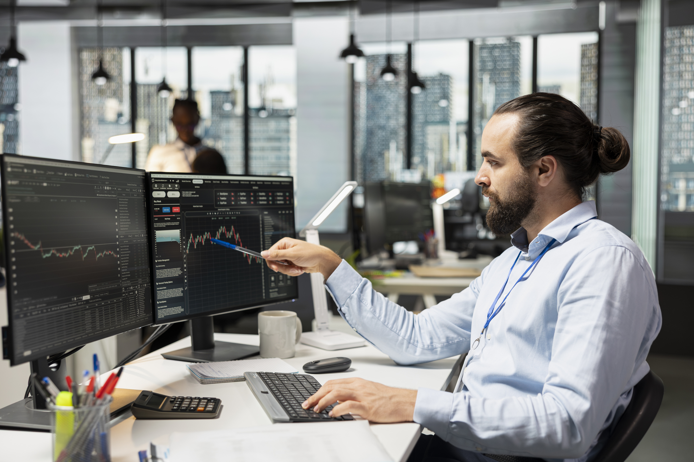 large-vecteezy_risk-analyst-looking-at-candlestick-charts-interface-to_70198577_large.jpg