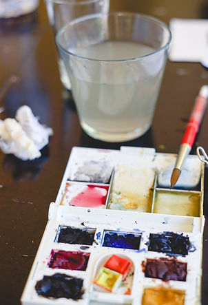 watercolour pallet and wate glass