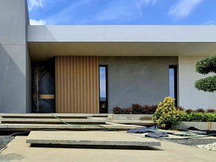 Minimalist single-story house within a premium residential complex in Satu Mare designed by Ion Eremciuc