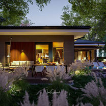 Side view of the l-shaped single story house plan with 3 bedrooms, evening mood