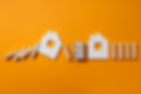 houses-wooden-blocks-and-cash-on-orange-backgroun-2026-01-09-07-48-40-utc.jpg