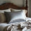 Thumbnail: Elegant bedroom styling featuring grey Canadian silk pillowcase on white bedding, CGM approved pure silk for healthy hair
