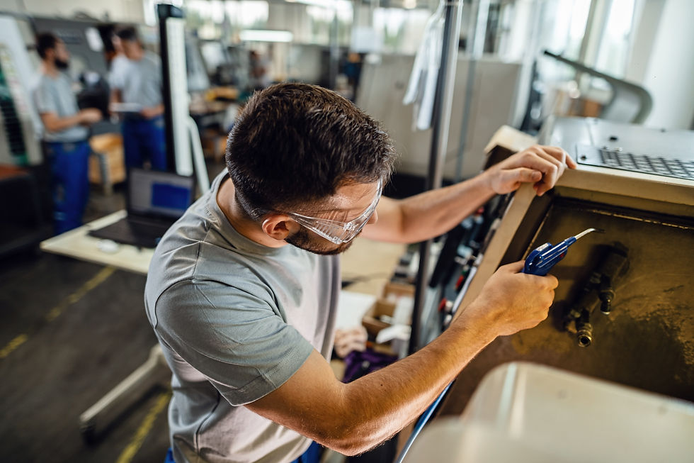 young-manual-worker-working-industrial-machine-factory-plant.jpg
