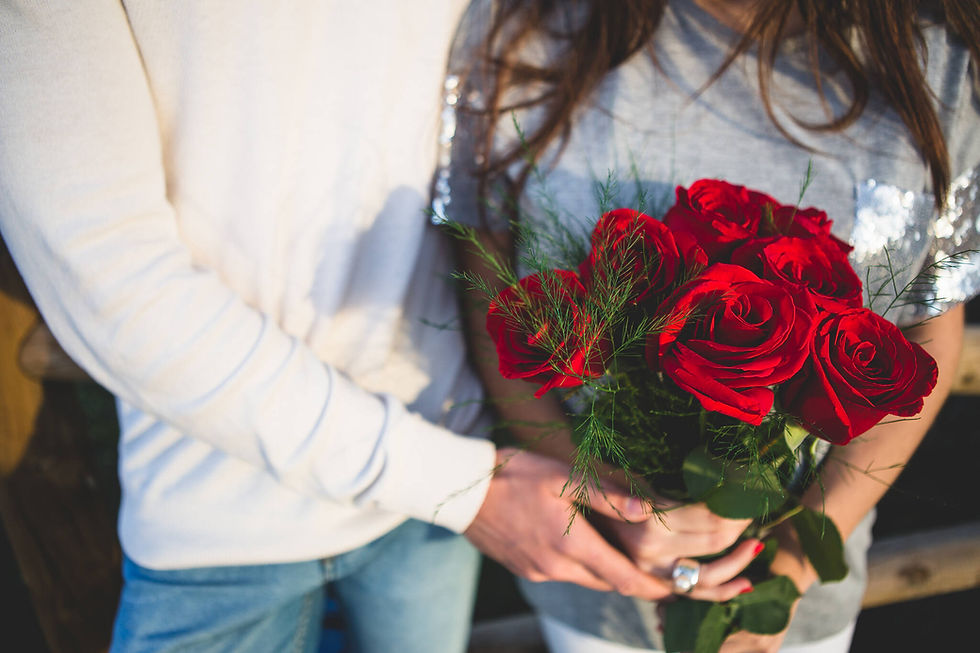 couple-with-bouquet-roses_Easy-Resize.com.jpg