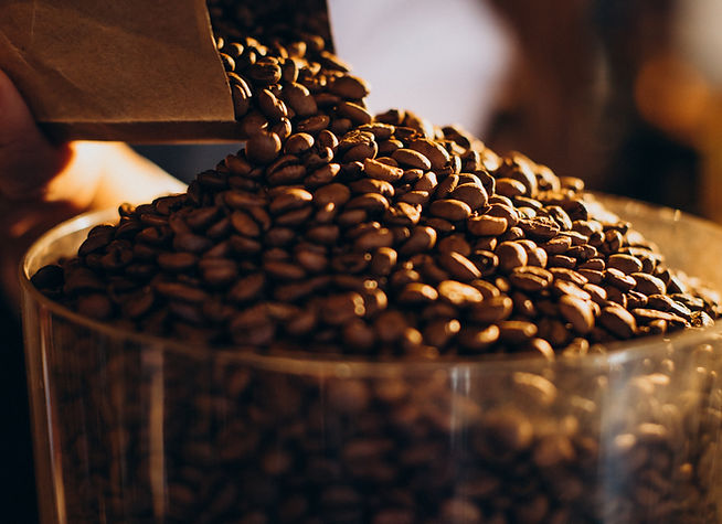 woman-grinding-coffee-coffee-machine.jpg