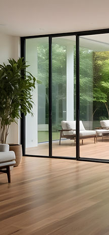 living-room-with-wooden-floor-large-window-that-has-view-backyard_edited.jpg