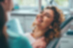 smilefilled-woman-looking-dentist_Easy-Resize_edited.jpg