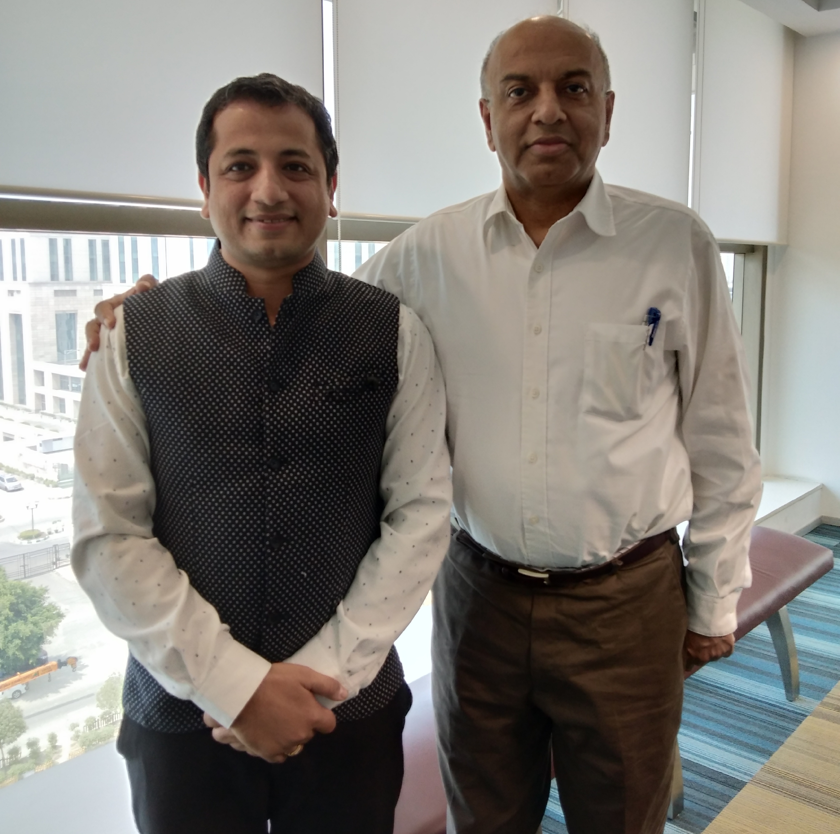 With Mr. Sanjeev Bikhchandani