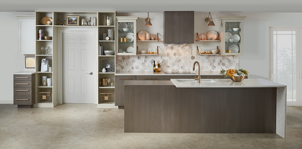 Brown cabinets in a kitchen featuring a waterfall island.