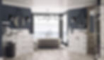 A bathroom with navy blue walls, a stone bathtub, and white vanities.