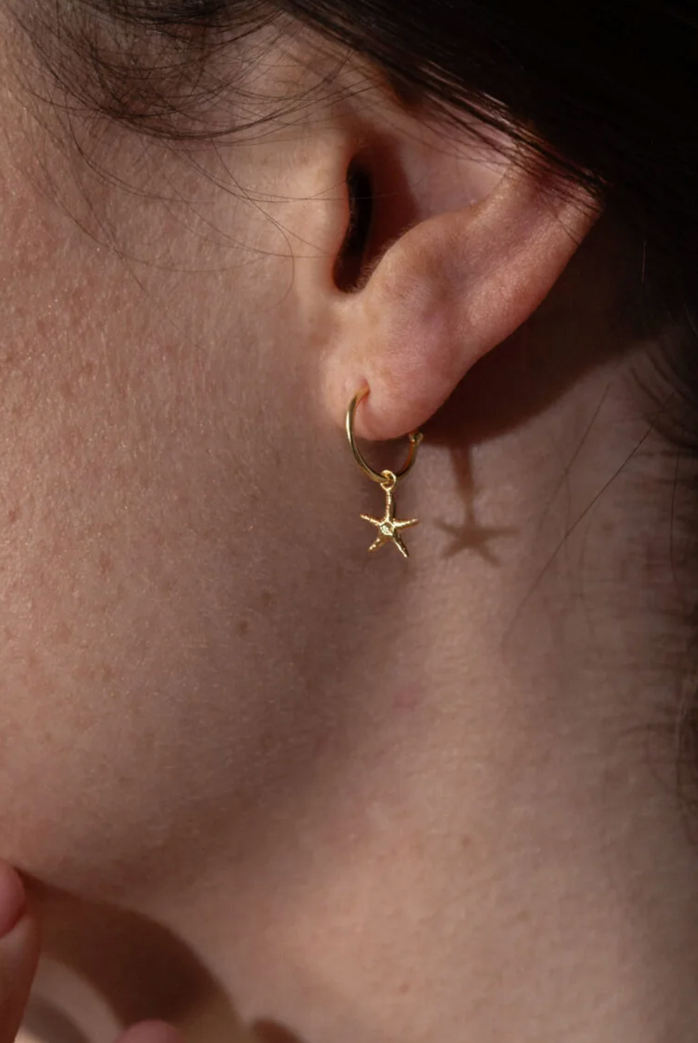 Thumbnail: Gold Starfish Earrings by One & Eight