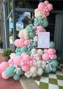 Pastel balloon installation and custom event entrance décor at Social 1832 event venue.